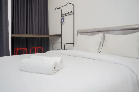Nice and Comfy Studio at Serpong Garden Apartment Отели в г. Cisauk
