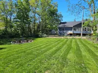 Cozy Home Near Downtown w/ Hot Tub, Fire Pit, Bikes, King Bed, and Full Kitchen