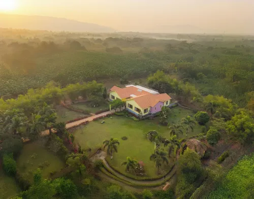 Ama Stays and Trails Nine Palms Alibag Hotels in Awas