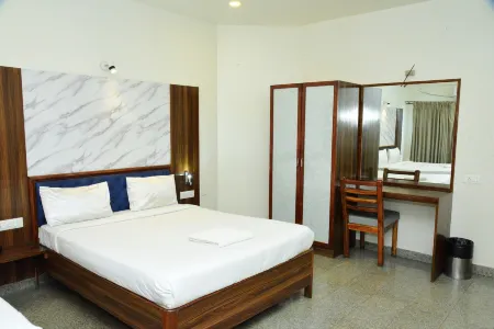 Sri Sai Residence Отели в г. Тумкур