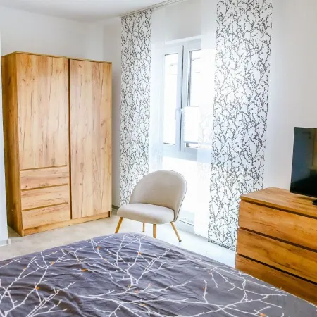 Windland apartment house on Lake Goitzsche for 8 people with lake view Отели в г. Поух
