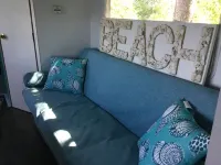 Get lulled to sleep by Lake Superior in Vintage camper 5 steps from the water