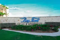 Gated 1-bedroom Condo in Portmore with AC, WiFi, Pool, Kitchen, TV, Beach View Hotels in 