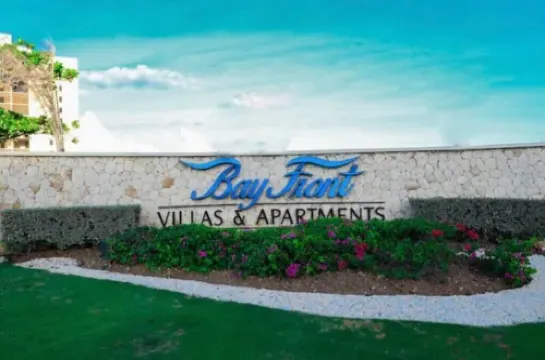 Gated 1-bedroom Condo in Portmore with AC, WiFi, Pool, Kitchen, TV, Beach View
