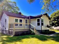 Cozy Beach Town Cottage Awaits.