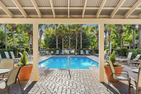 Golf Cart + Pool Access Near Baytowne & Beach Coral Starfish by Avantstay