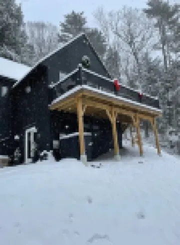 Modern family-friendly home with private beach access on Newfound Lake
