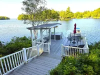 Tranquil, serene Sebago Lakefront House on 2 wooded acres - 300ft waterfront! Hotels in Casco