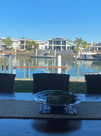 Luxury canal home with pontoon and pool. Direct access to Pumicestone passage.