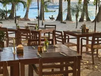 Sundown Resort & Austrian Pension House Hotel dekat Pantai Cagban