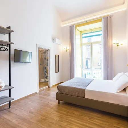 Guest Rooms Bellini Отели рядом с достопримечательностью «Концертный зал «Напулитаната»»