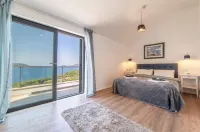 Apartmani D & J with Heated Pool & Stunning Sea View - Airport Shuttle