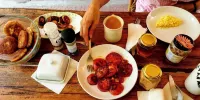 Evergreen Eco Lodge Retreat Hotel di Brikama