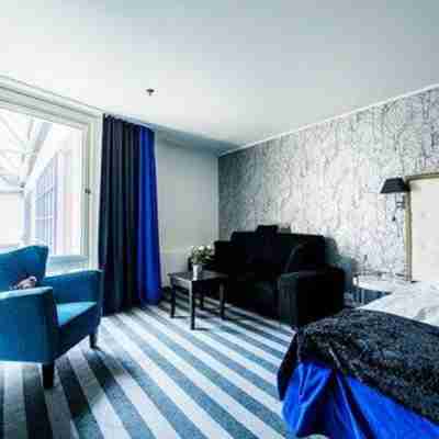 Home Hotel Grand Olav Rooms