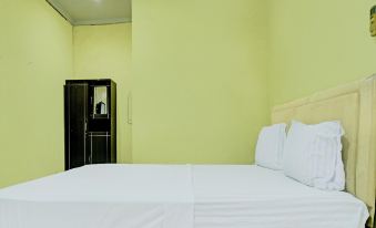 Capital O 92316 Wisma Widya Loka Pratama Near Futsal Tebing Gading