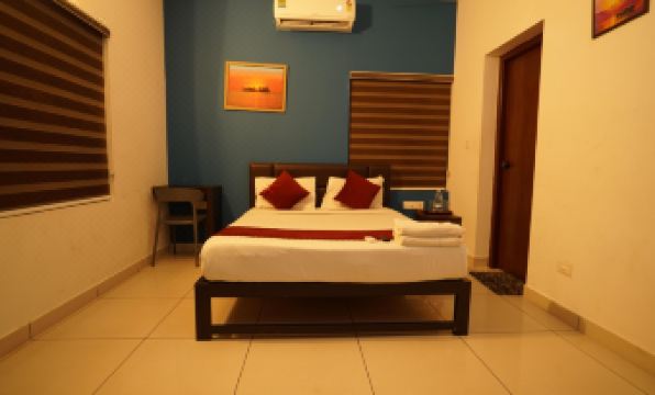 Atmos Inn Calicut Near Aster Mims Hospital
