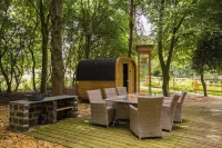 Woodland Cabin with Private Lake, Sauna + Fire Pit