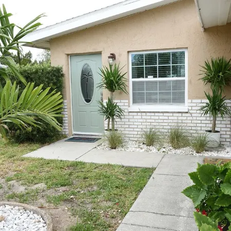 Unique waterfront home, Hot Tub, private boat dock,  walk to beach, pet friendly