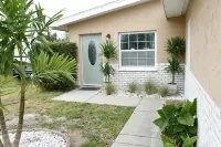 Unique waterfront home, Hot Tub, private boat dock,  walk to beach, pet friendly