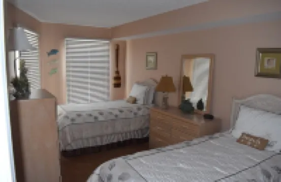 Two bedroom condo with deck overlooking the ocean. Private beach!