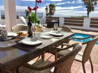 Modern villa on the golf course with stunning views, Wifi and heated pool