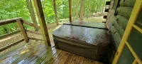 Enjoy a Hot Tub and a peaceful Cabin out in the country at High Ridge Cabins.