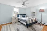 Walk to beach, fenced yard, and toys for the kids!