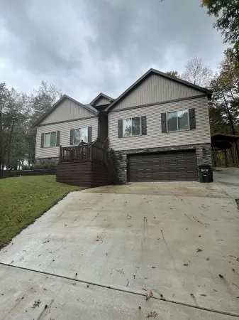 House located on Golf Course, community pools, hiking and ATV trails, close to G