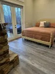 Luxury cabin in county but not far from downtown. Hot tub on back porch.