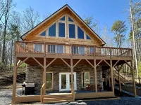 New cabin with king size bedrooms, en suite bathrooms, smart TV, decks & views.