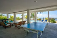 Wide Horizon oceanfront.  4 bedroom, 4 ½ bath,  kayaks, pool + observation deck.