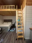 Secluded creekside treehouse cabin in Shelby with hot tub, AC, WiFi