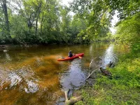 Rustic Riverside A-Frame Retreat: Secluded Charm.