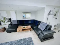 Entire lower level in a private home with walkout fenced yard.