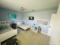Tropical Resort Style Backyard, Private and only a 7 minute drive to the Beach! Hotels near Mackle Park