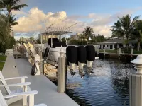 Intracoastal 🌴 Waterfront Pool Home, Walk to Beach, Heated Pool, Sit on Dock