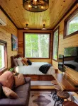 Near Pictured Rocks and trails, access to AuTrain River, has private hot tub