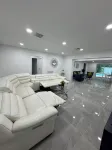 Charming 4-bedroom house with WiFi, pool, fitness room in peaceful Boynton Beach