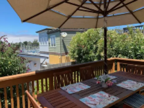 4th house from Twin Lakes Beach and a 2 minute walk to the Crow’ Nest and Harbor