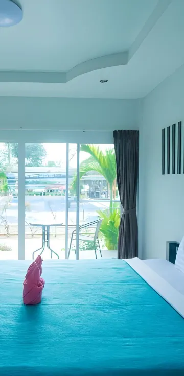 ห้องดีลักซ์ เตียงใหญ่ 1 เตียง