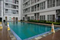 Cozy Minimalist Studio @ Taman Melati Margonda Apartment by Travelio