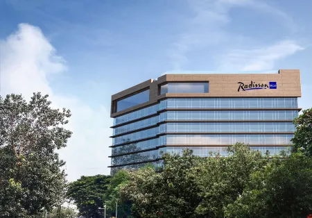 Radisson Blu Mumbai International Airport Отели рядом с достопримечательностью «Intellect Design Arena Ltd»