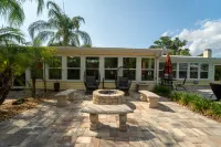 Pool Area, Lounge, Koi Pond and Waterfall - Stunning Retreat Hotels in Fruit Cove