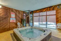 Lakefront Condo with Mountain Views & Shared Hot Tub - Walk to Town & Ski Access