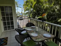 Tropical Gardens and Serene Community Amenities - Charming Island Retreat
