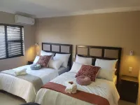 The Royal Prime Guest Lodge Hotels near Whispering Tree Tops