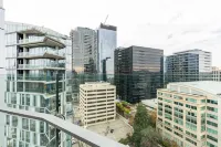 Sophari Bellevue Tower Apts Отели в г. Белвью