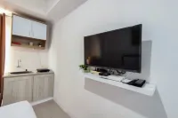 Comfort and Well Design Studio at Paltrow City Apartment