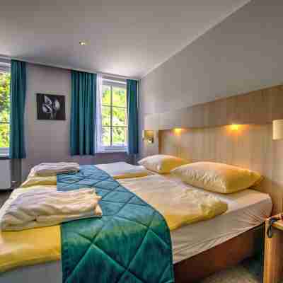 Hôtel du Commerce Rooms