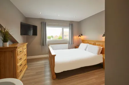 Host & Stay - the Old Jail Barber's Shop Отели рядом с достопримечательностью «Парк Плейдейл Фарм»